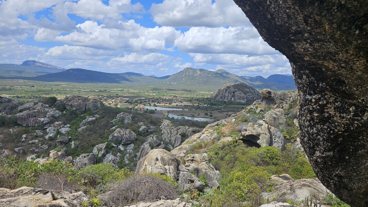 View from a cave-mouth overlook on the trail, looking down over the valley and Açude do Cedro