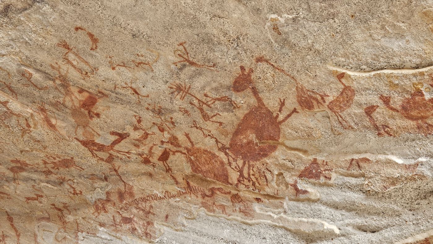 Ancient rock art panel with painted figures, Serra da Capivara